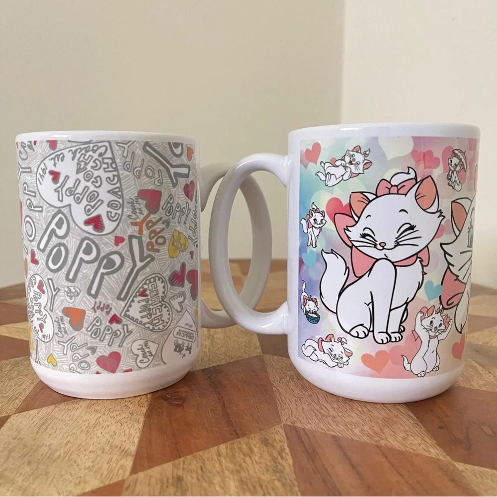 NEW 2 Pcs Mugs. Disney The Aristocats Marie + Poppy 15oz mugs. NWT Hand Crafted